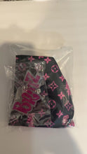 Load and play video in Gallery viewer, Black and Pink Bratz scrub cap with matching badge
