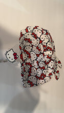 Load and play video in Gallery viewer, Red hello kitty scrub cap with matching badge
